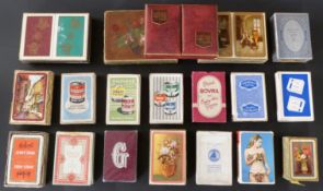 A box of tax wrapped packs of English playing cards