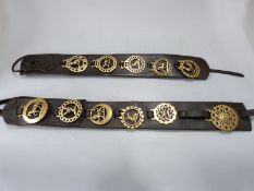 Two leather heavy horse collars with 19thC/20thC horse brasses, many with animal and bird