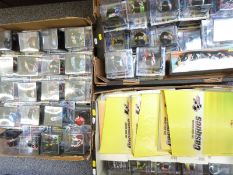 Eighty-six Altaya diecast model Moto GP motorbike helmets, all in original display boxes with