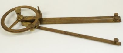 WWII German style naval/submariner brass course plotter with small plaque bearing Nazi symbol and