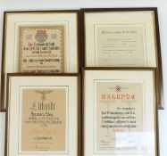 Four German WWII Third Reich Nazi style framed certificates including a youth example