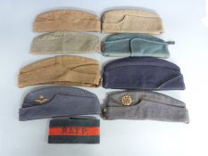 A small collection of military side hats/caps including three German examples