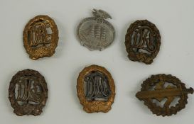 Four German Nazi Third Reich sports badges and a Seefahrt badge