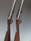 Cased pair of Westley Richards 12 bore 'Gold Name' side by side boxlock ejector shotguns each with