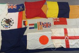 A collection of military / national flags including Japan, blue ensign with crossed swords, Ulster
