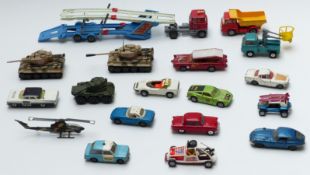 Seventeen Corgi Toys diecast model vehicles including military tanks, Monkeemobile, Mark IV Car