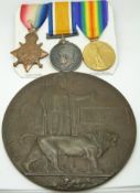 British Army WWI medals comprising 1914/1915 Star, War Medal and Victory Medal, named to Pte E A