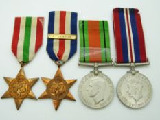 British Army WWII medals comprising the France & Germany Star with Atlantic clasp, the Italy Star,