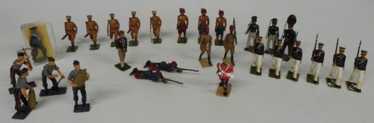 Twenty eight Britains and similar lead and diecast model soldiers including Indian Army, Navy etc,