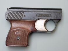 Mondial Model 1949 6mm blank firing starting pistol with molded faux wooden grips, 12cm long.