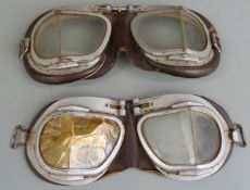 Two pairs of leather backed folding flying goggles