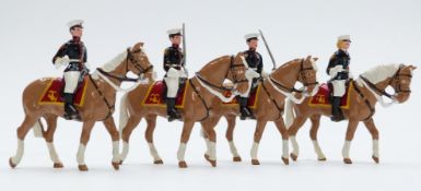 Four CBG Mignot diecast model cavalry soldiers.