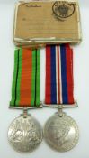WWII medals comprising War Medal and Defence Medal, in original box awarded to Mrs Mabel Palmby,