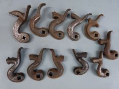 Eleven various gun hammers including one for a pinfire shotgun, most with engraved decoration.