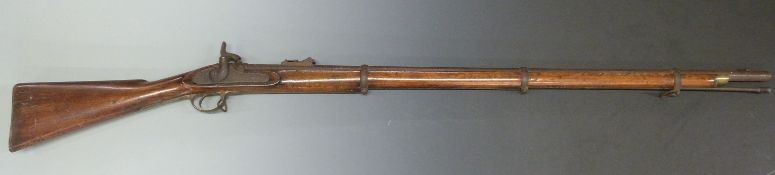 Enfield three band percussion hammer action rifle with brass trigger guard and butt plate,