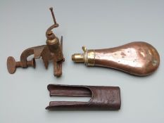 Bartram & Co Nimrod copper and brass powder flask, 19.5cm long, together with a 12 bore shotgun