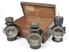 A set of three Lucas King's own veteran or early motor car oil lamps, two being F141 front lamps the