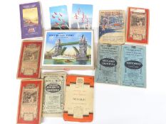 Nine vintage motoring and similar mainly linen backed maps and a Victory wooden jigsaw puzzle of