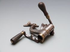 G & J W Hawksley 12 bore steel and brass shotgun cartridge reloading tool with turned horn handles.