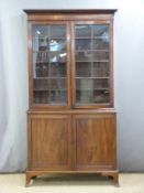 19thc glazed bookcase/cabinet with adjustable shelving raised or splayed bracket feet, W106 x D36