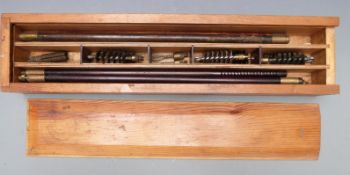 Shotgun cleaning kit in fitted wooden case