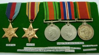 British Army WWII medals comprising the 1939/1945 Star, the Africa Star, War Medal, Defence Medal