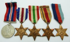 British Army WWII medals comprising the 1939-45 Star, France & Germany Star, Italy Star, Africa Star
