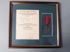German Army WWII Ostmedaille / Russian Front medal and certificate, framed and mounted