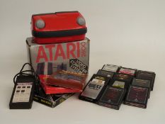 Atari 2600 video computer system, video touch pad and 17 games/ programs, some in original boxes,