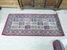 Red ground runner rug marked Valby Ruta, 80 x 180cm