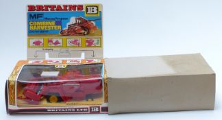 Britains diecast model Massey Ferguson Combine Harvester with red body and reel and yellow hubs