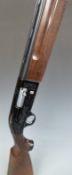Beretta A301 12 bore semi-automatic shotgun with engraved locks, chequered semi-pistol grip,