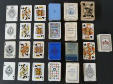 Five single packs of English playing cards by various makers, with crest backs to include Royal