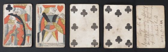 Five playing cards with secondary use game or quiz writing on backs, comprising 7, 8, 9, King of