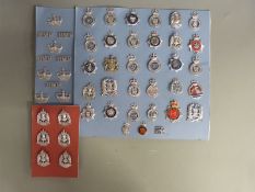 A collection of police badges including Dewsbury, West Yorkshire and West Sussex, Scottish and HM