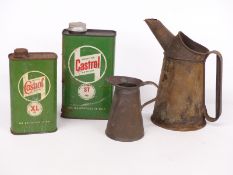 Two vintage garage oil cans and two Castrol oil cans, one XL motor oil the other ST 90 gear oil