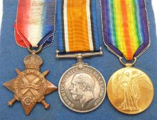 British Army WWI medals comprising 1914/1915 Star, War Medal and Victory Medal, named to Captain A T