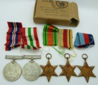 WWII British medals comprising 1939/45 Star, Africa Star, Italy Star, Defence Medal and War Medal,