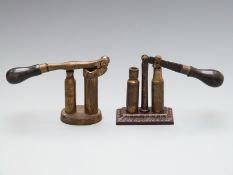 Two shotgun cartridge reloading cappers/decappers