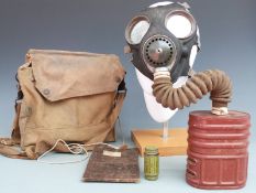 British Army WWII gas mask and canister MkIV with canvas bag etc