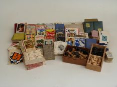 Quantity of games and playing cards, together with two chess sets, one Staunton, height of king 5.