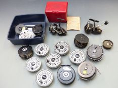 A collection of fly and coarse fishing reels including Mitchell 324, Rimfly reel with four spare
