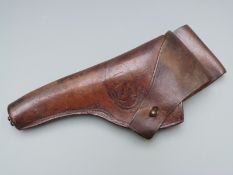 American brown leather pistol or revolver holster with brass lanyard ring stamped to the front US