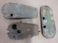 Three vintage motorcycle fuel tanks, two being flat tanks