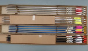 Four boxes of Longshot archery arrows, one set of four, three sets of seven