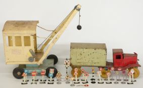 A pressed steel model lorry with red cab, pale green body and wooden wheels together with a Tri-