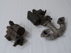 Two Austin Seven Zenith 22 FZ carburettors and an inlet manifold