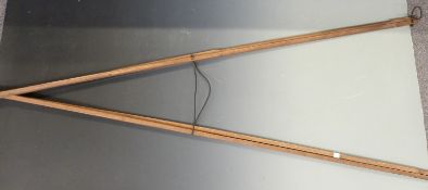 A wooden adjustable rifle rest, 174cm long
