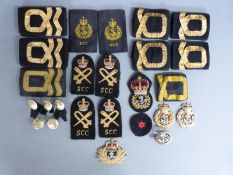 A small collection of Sea Cadet Corps badges, epaulettes and buttons