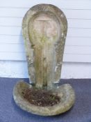 A carved stone trough with cut cross recess to inner base, probably a Roman or Saxon child's